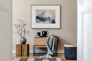 InkPoster digital art display featuring traditional Japanese Mount Fuji artwork in a modern interior